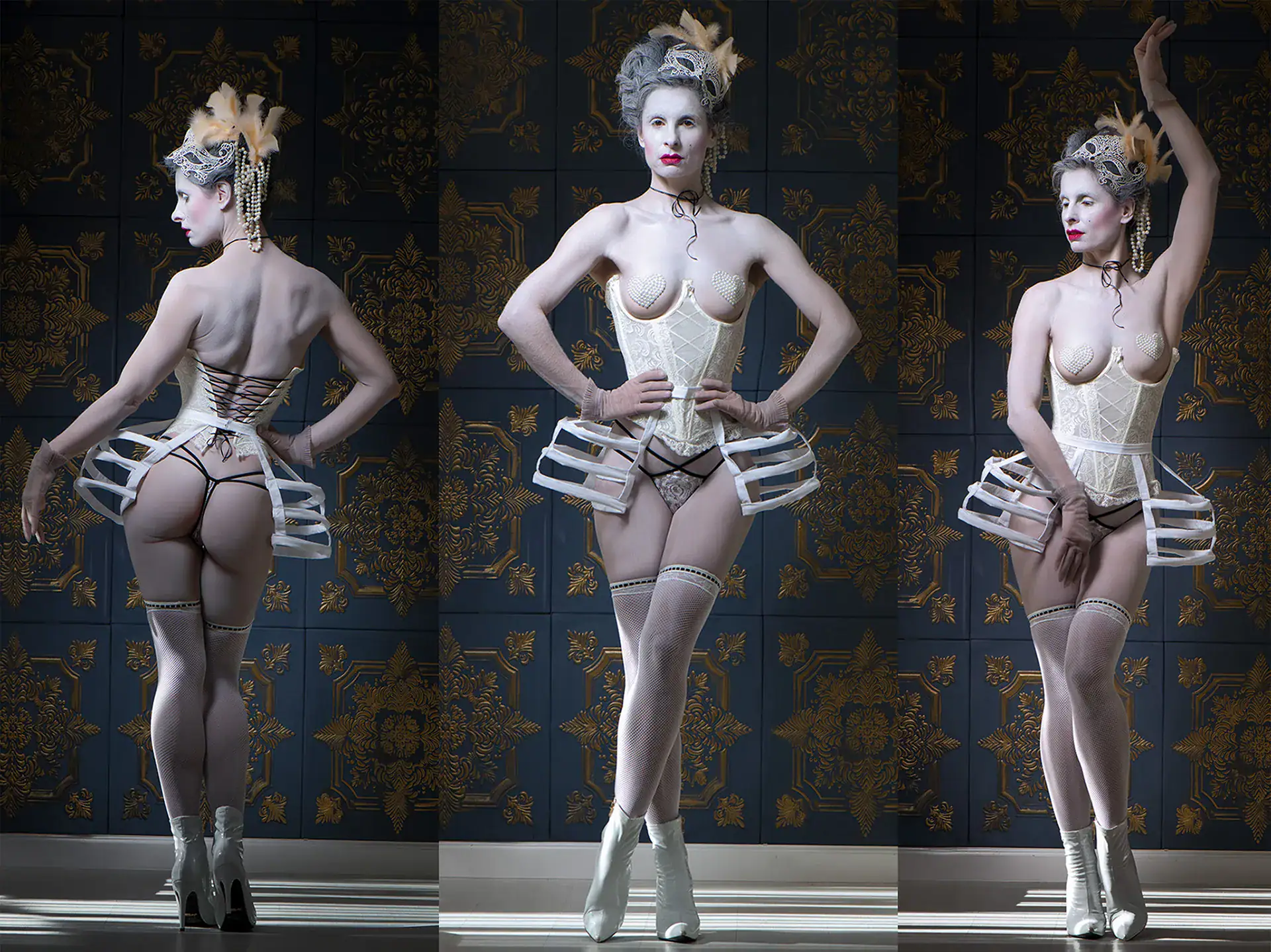 Marie Antoinette Conceptual Boudoir Photography – Regal and Sensual Conceptual boudoir portrait inspired by Marie Antoinette, featuring a model in vintage corsetry, pearl nipple covers and headdress, posed against an ornate gold and navy backdrop. Elegant boudoir setup in Johannesburg