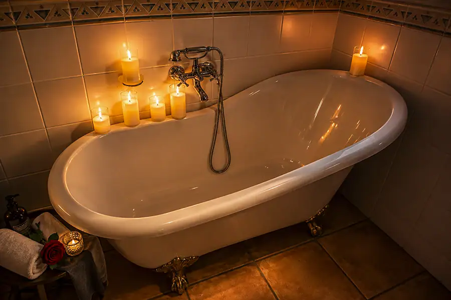 Vintage Clawfoot Bath | Boudoir Fusion Photography Johannesburg Vintage clawfoot bath at Boudoir Fusion Photography's private Johannesburg studio, styled with candlelight to create elegant, luxurious boudoir photographs.