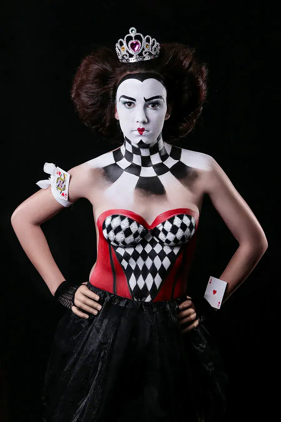 Queen of Hearts Conceptual Body Art Queen of Hearts inspired conceptual portrait with harlequin body paint, playing cards and crown
